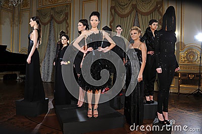 NEW YORK - FEBRUARY 06: Models pose at static presentation for Russian Fashion Industry Reception F/W 2013