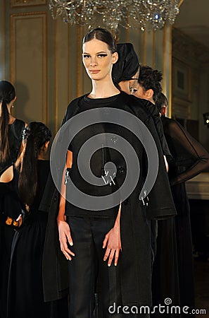 NEW YORK - FEBRUARY 06: Models pose at static presentation for Russian Fashion Industry Reception F/W 2013