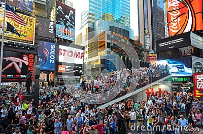 NEW YORK - JULY 26: Crowd cheering models on the bus at New York City streets