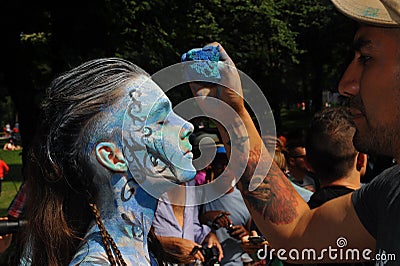 NEW YORK - JULY 26: Nude models, artists take to New York City streets during first official Body Painting Event