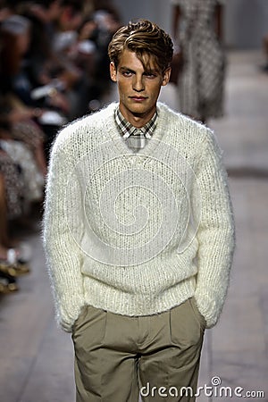 NEW YORK, NY - SEPTEMBER 10: A model walks the runway at Michael Kors Spring 2015 fashion collection