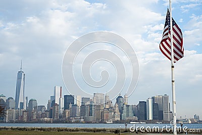 NEW YORK, US - NOVEMBER 22: American flag with Manhattan skyline