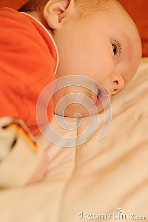 Newborn baby on white blanket