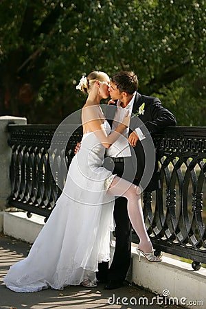 Newly Married Couple Kissing