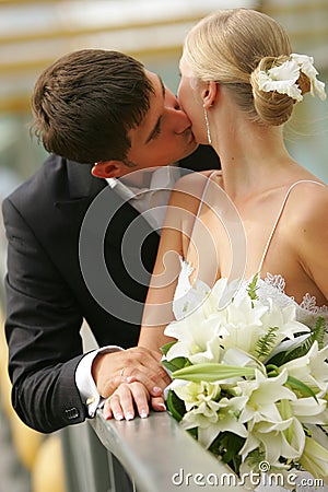 Newly Married Couple Kissing