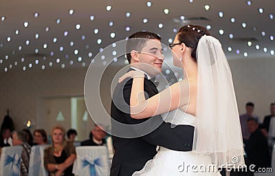 Newlywed couple dance