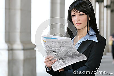 News: Business Woman Reading Newspaper