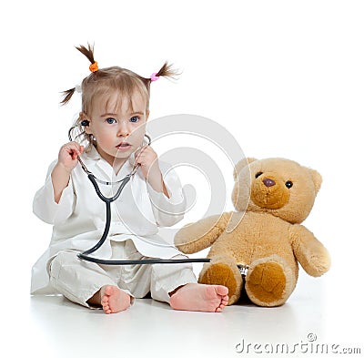 http://thumbs.dreamstime.com/x/ni%C3%B1o-con-la-ropa-del-doctor-y-del-oso-de-peluche-23783929.jpg