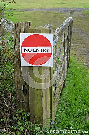 No entry sign on gate.