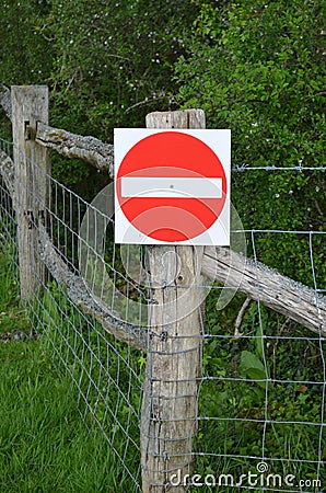 No entry sign on gate.