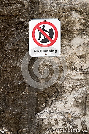 No Rock Climbing Danger Sign on Cliff