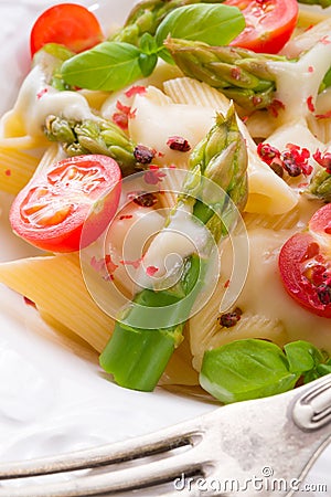 Noodles with asparagus in cream-cheese sauce