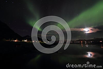 Northern Light mirroring in a Lofoten s fjord