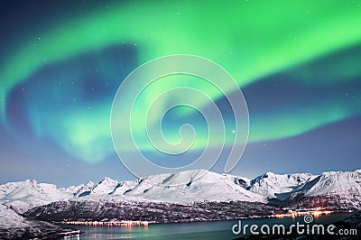 Northern lights above fjords in Norway