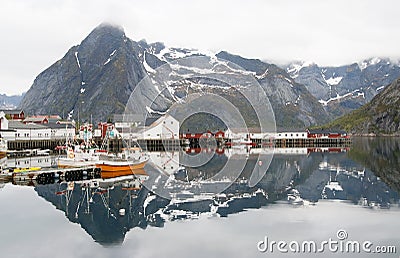 Norwegian fjord with reflection in water