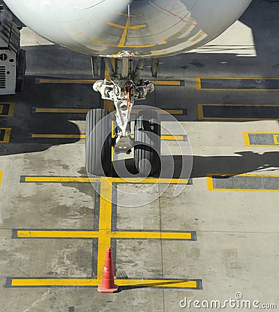Nosewheel of a parked commercial airliner