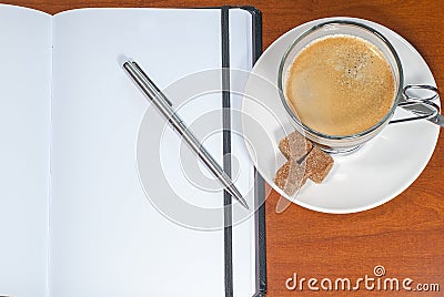 Notebook and cup of coffee