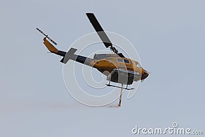 NOVEMBER 9 : Waterbomber helicopter with full load heading to fire