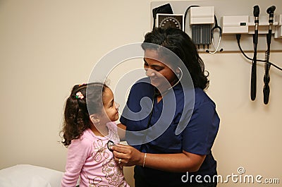 Nurse Checks Young Patient