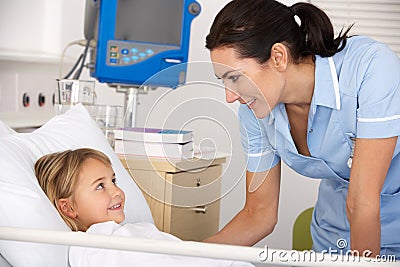 Nurse with child patient in UK A&E