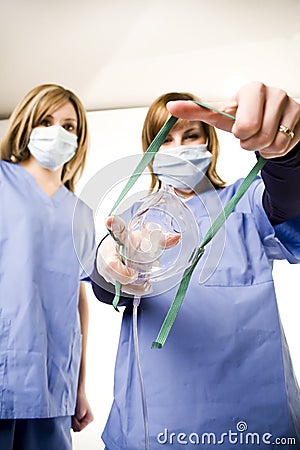 nurse-holding-anesthesia-mask- ... nurse-holding-anesthesia-mask- ...