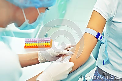Nurse preparing to make an injection for blood taking. Medical