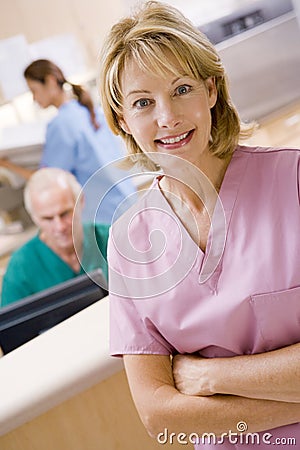 Nurses In The Reception Area Of A Hospital