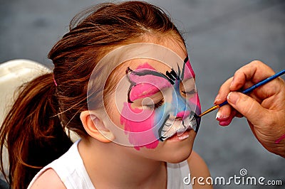NYC: Artists Face Painting a Little Girl