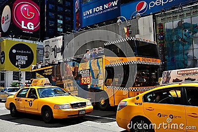 NYC: Taxis and Tour Bus in Times Square