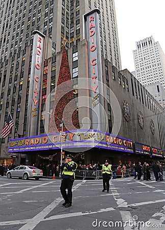 NYPD officers regulate traffic during gridlock near New York City landmark Radio City Music Hall