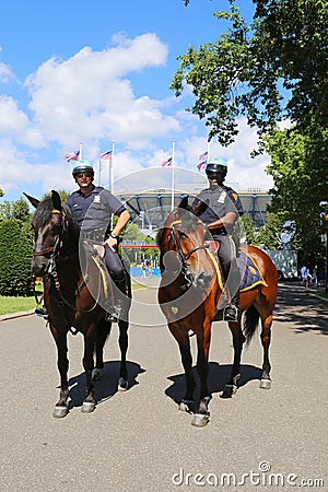 NYPD police officers on horseback ready to protect public at Billie Jean King National Tennis Center during US Open 2014