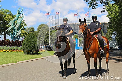 NYPD police officers on horseback ready to protect public at Billie Jean King National Tennis Center during US Open 2014