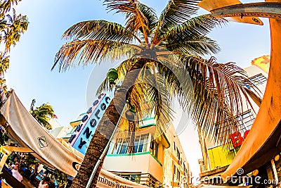 Ocean Drive in Miami with Restaurants in front of the famous Art Deco Style Colony Hotel