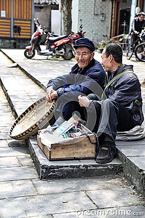 Odl people chatting in yuantong town,in sichuan,china