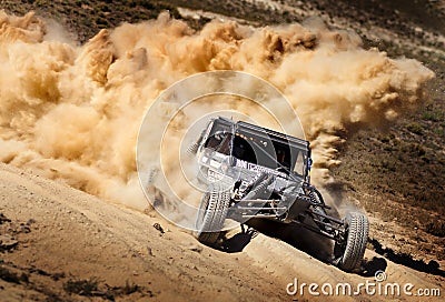 Off Road Buggy Race with Dust Plume