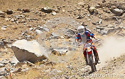 Off Road Dirt Bike Racer with Dust Plume