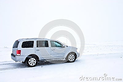 Offroad Car on the Snowy Road