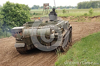 Offroad scenery with driving tank