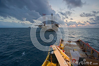 An offshore vessel during towing operation of an oil platform