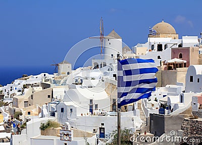 Oia Windmills And Greek Flags - Santorini Island