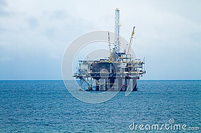 Oil Derrick and Platform On An Overcast Day