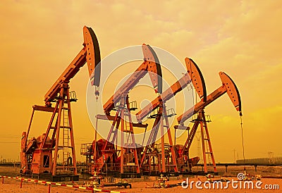 Oil pump against setting sun