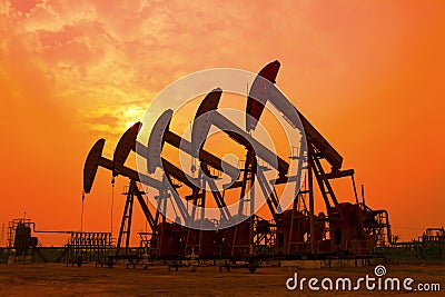 Oil pump against setting sun