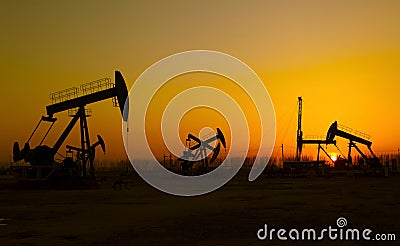 Oil pump against setting sun