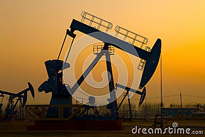 Oil pump against setting sun