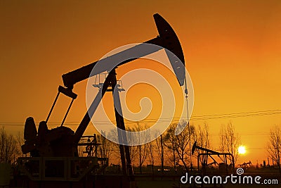 Oil pump against setting sun