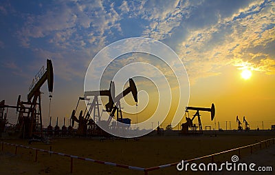 Oil pump against setting sun