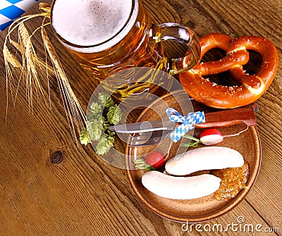 Oktoberfest menu with beer, white sausage, pretzel and radish