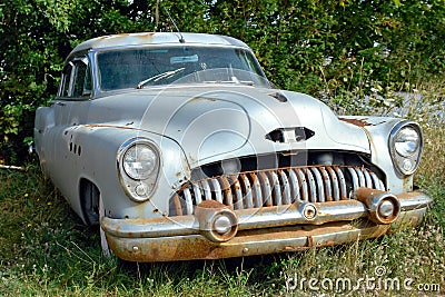 Old Abandoned Classic Vintage American Car in Yard