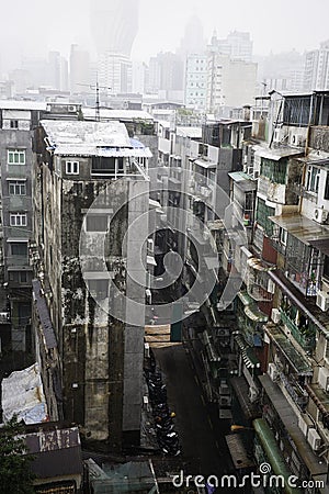 Old apartment blocks Macau China on a rainy day.